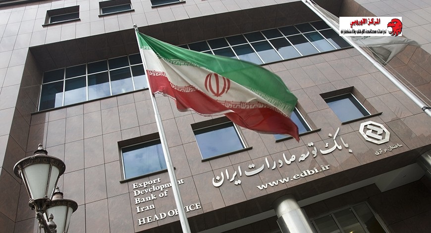 An Iranian flag flutters in front of the head office of the Export Development Bank of Iran (EDBI) in Tehran